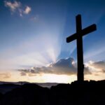 Jesus On The Cross With Sunset Background / Stock Photo - Our ...