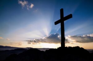 Jesus On The Cross With Sunset Background / Stock Photo - Our ...